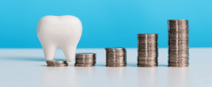 tooth next to money illustrating dental asset share and dental share purchase